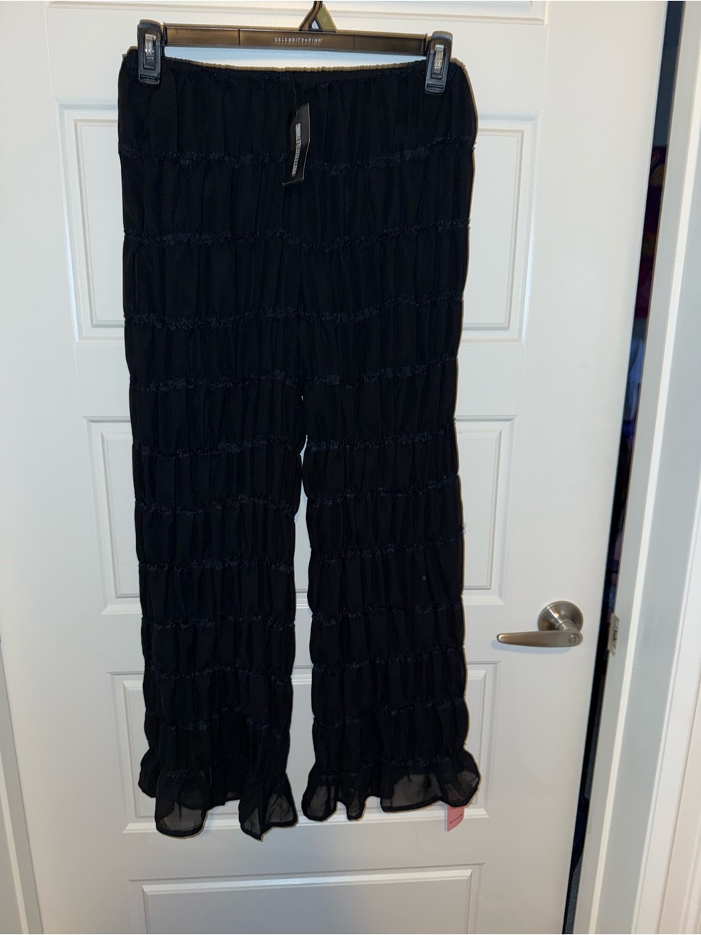 PrettyLittleThing Black Smocked Wide Leg Pants with Ruffle Hem
